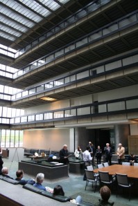 Peter C. Papademetriou, an expert on Finnish-American architect Eero Saarinen, who designed the Bell Labs building in Holmdel, N.J., delivers a presentation on Saarinen to architects in the atrium of the modernist landmark.
