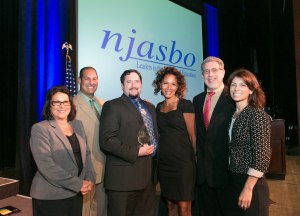 The NJASBO Associate Business Members Executive Committee congratulate Steven G. Siegel of Spiezle Architectural Group (center) as he accepts the association’s Above & Beyond Award.  From left are President Nancy Riccio, G.R. Murray/O’Gorman & Young, Inc.; Secretary Alan Walker, Atlantic Tomorrows Office; Latonya Jackson, G.R. Murray/O’Gorman & Young, Inc.; Immediate Past President Bill Pappalardo, GREYHAWK Construction Managers & Consultants; and Vice President Christine Messina, All Risk, Inc.
